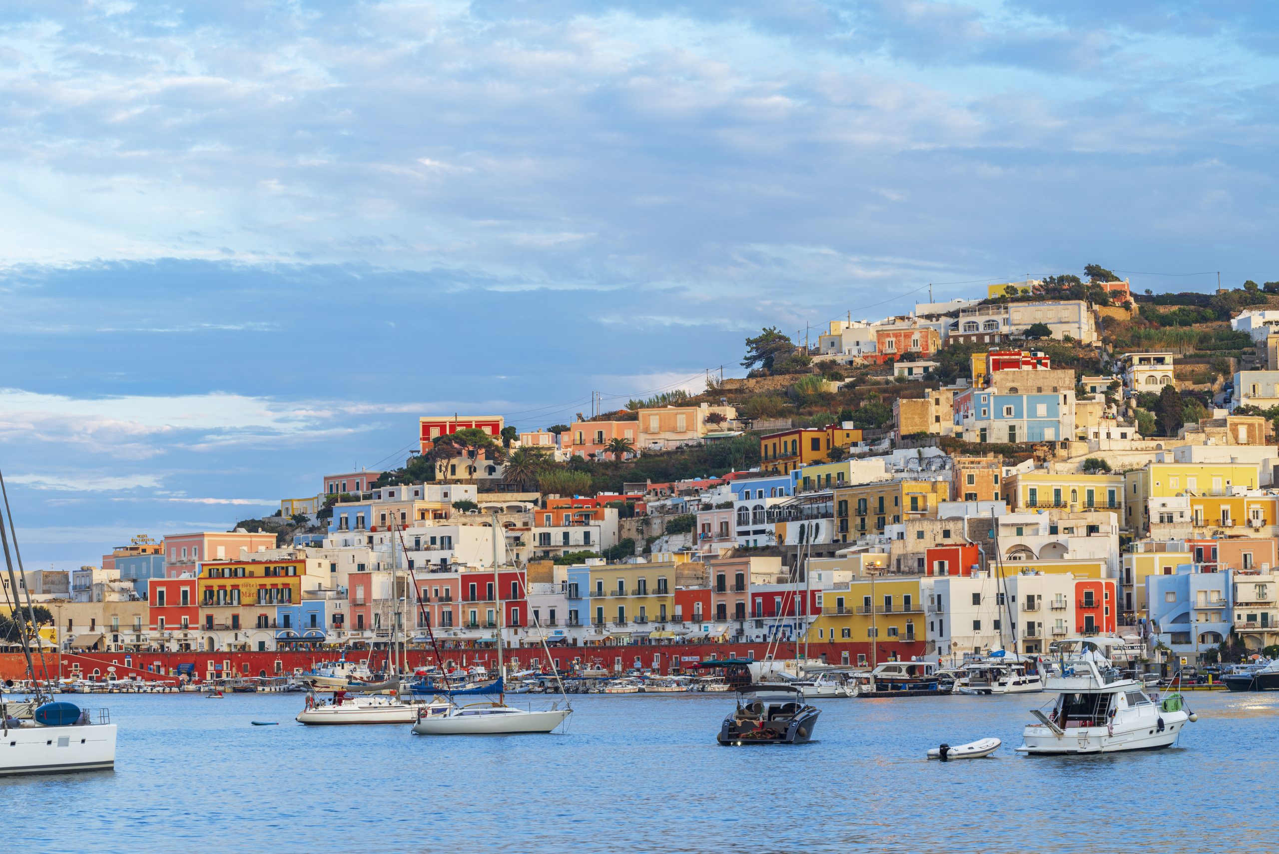 The famous italian village of Ponza with colorful houses and boats at sunset, Ponza Island, Pontine archipelago, Tyrrhenian sea, Latina province, Latium, Italy